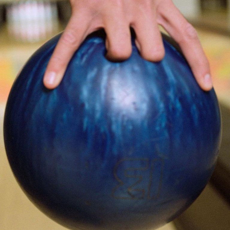 hold a bowling ball